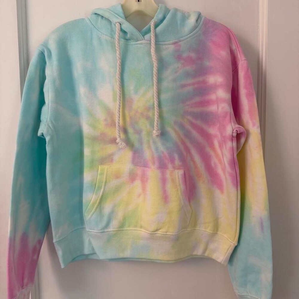 Dreamsicle Tie-dye crop hoodie in pastel colors with pink, blue, and yellow swir